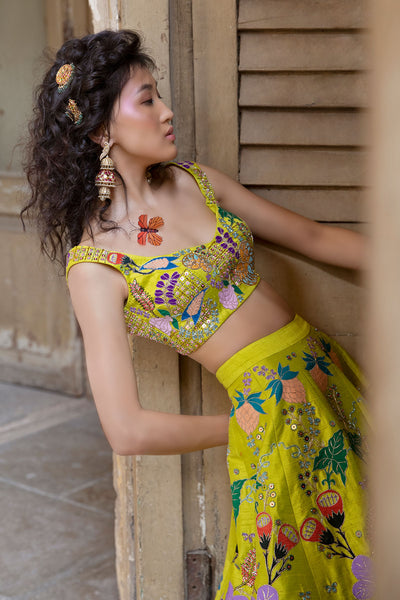 Full right side view of lime lehenga set