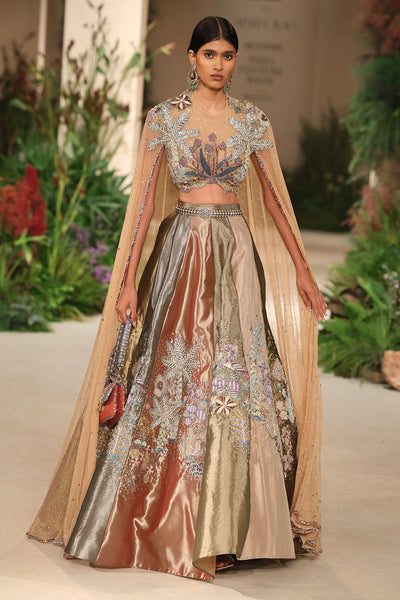 Flowing skirt detail capturing the Wild At Heart multicolour tissue mk lehenga’s movement and vibrant embellishment