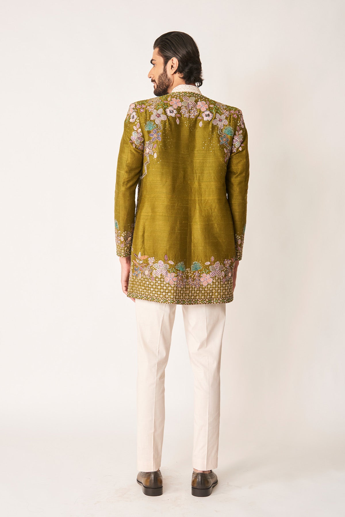 Olive green ensemble back profile for men