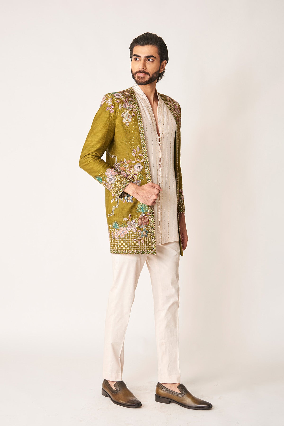 Right profile of raw silk olive jacket outfit