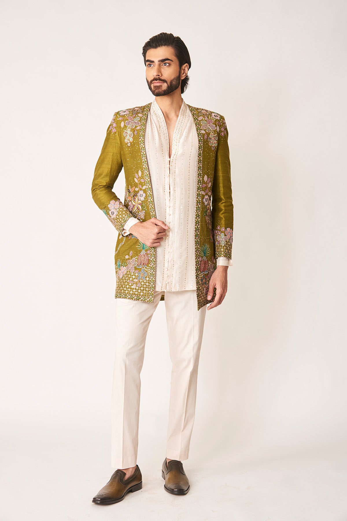 Man wearing olive open raw silk jacket set