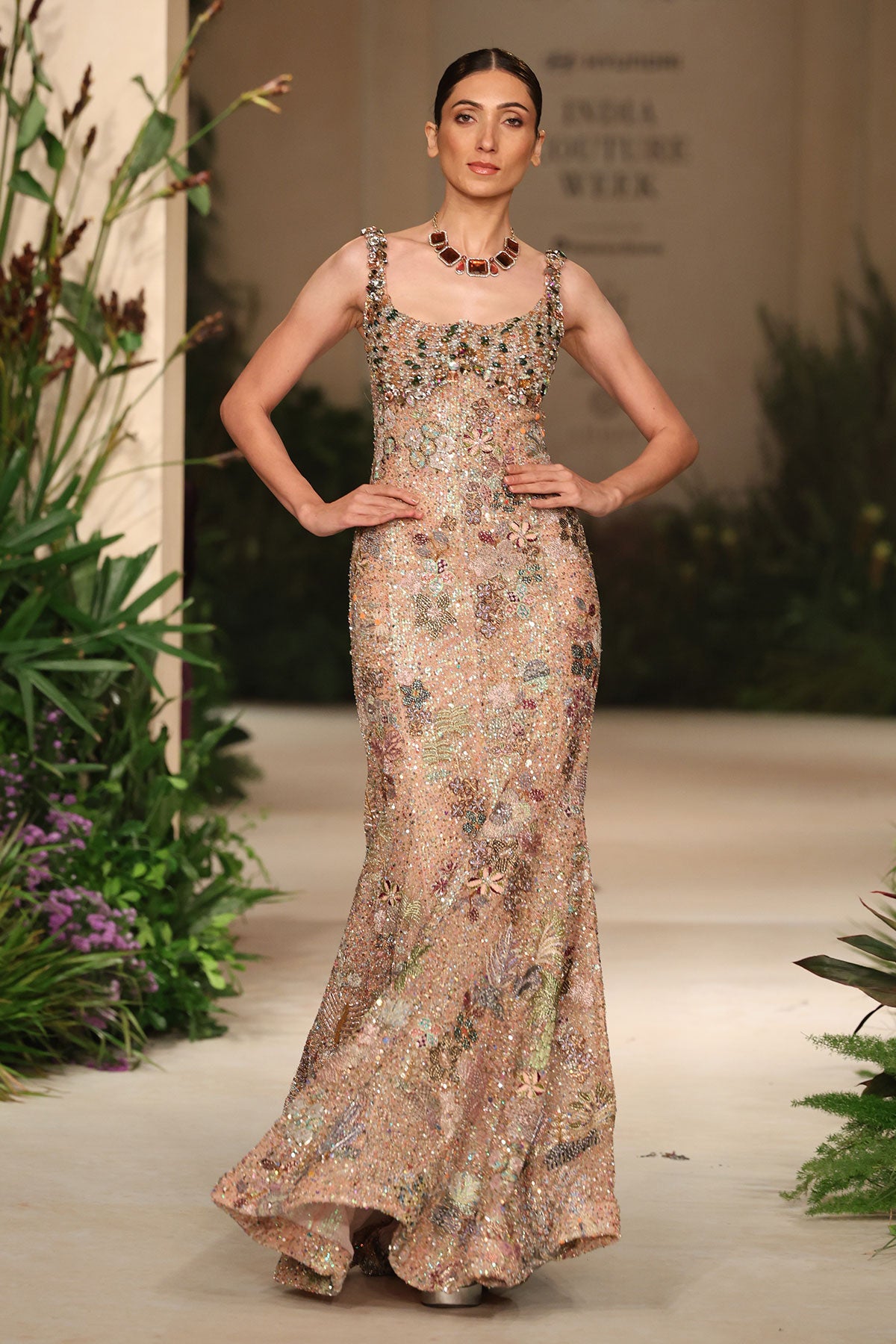 Closeup of the Wild At Heart beaded crystal bodice featuring intricate embellishment on peach tulle