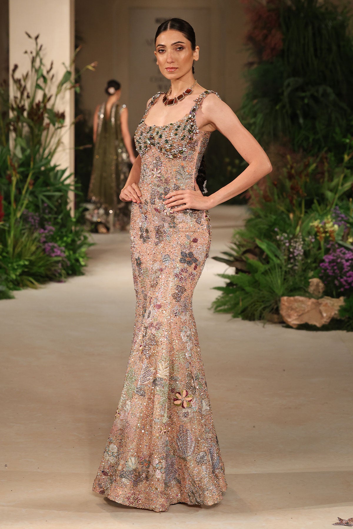 Embellished bodice closeup showing the Wild At Heart peach gown’s beaded and crystal detailing