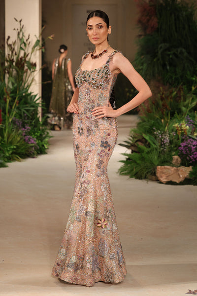 Embellished bodice closeup showing the Wild At Heart peach gown’s beaded and crystal detailing