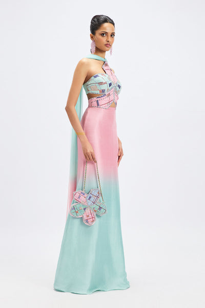 Flowing silhouette of pink aqua ombre gown side view