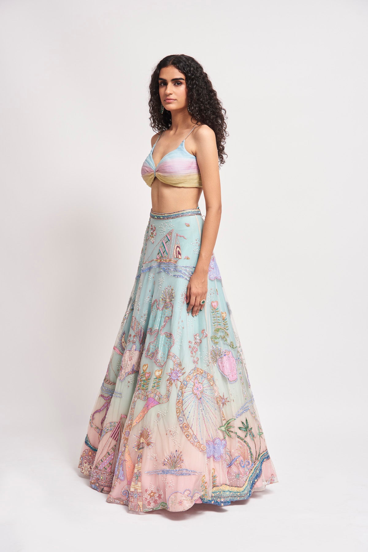 Flow of cape and lehenga from left side