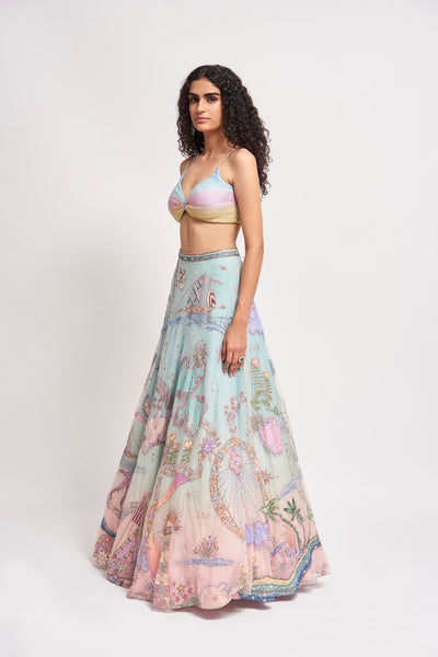 Flow of cape and lehenga from left side