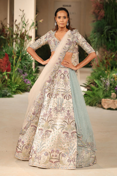 Front view of the blouse paired with the Wild At Heart silver banarasi tissue brocade bow hk lehenga