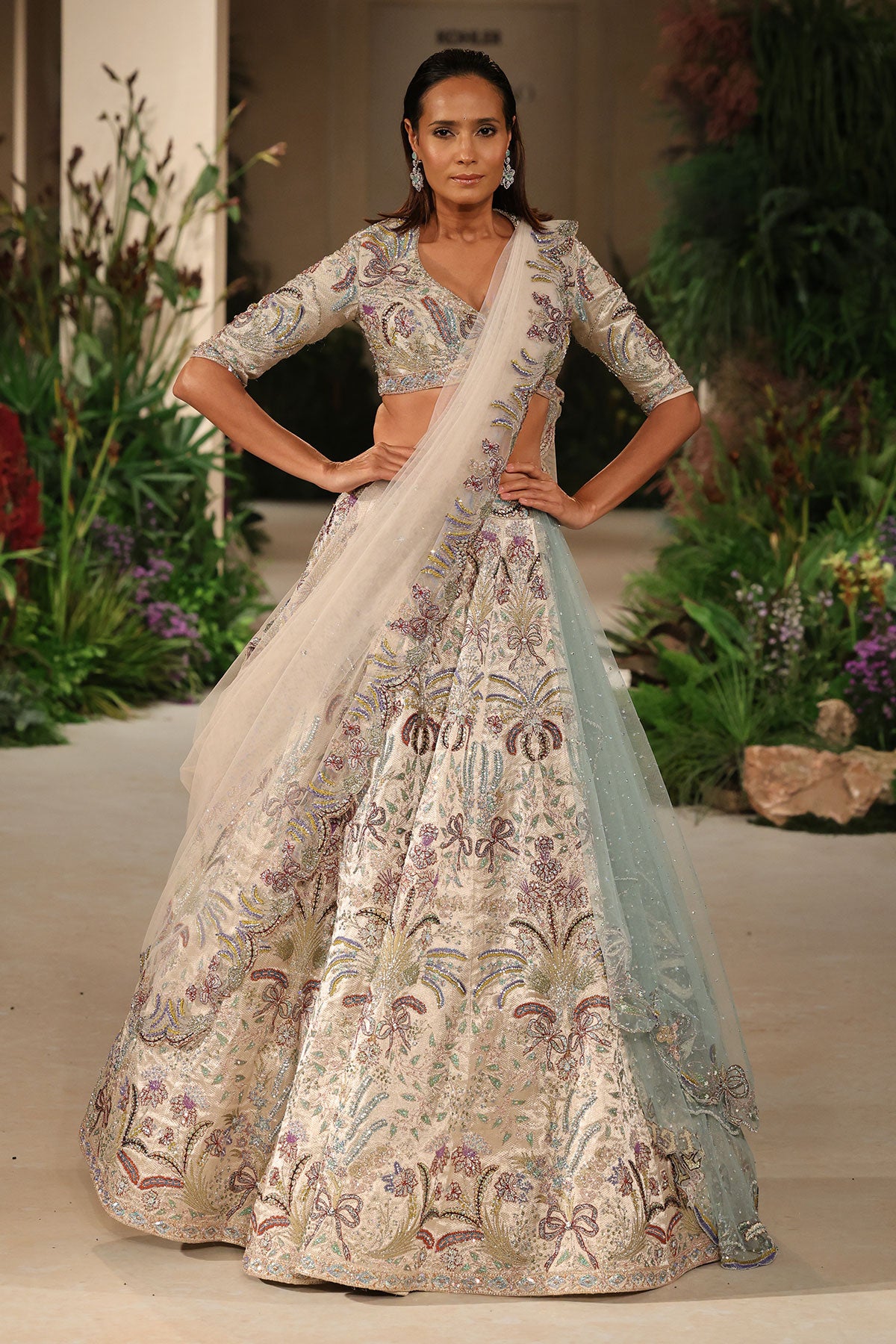 Waistline detail featuring layered applique and couture shaping from the Wild At Heart silver lehenga