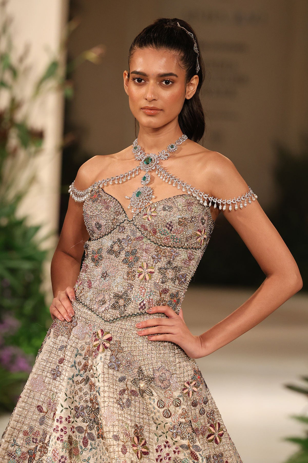 Front view of the corset blouse styled with the Wild At Heart silver banarasi tissue brocade check hk lehenga