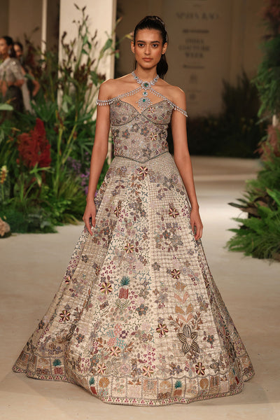 Front view of the Wild At Heart silver embellished check hk lehenga paired with the corset blouse