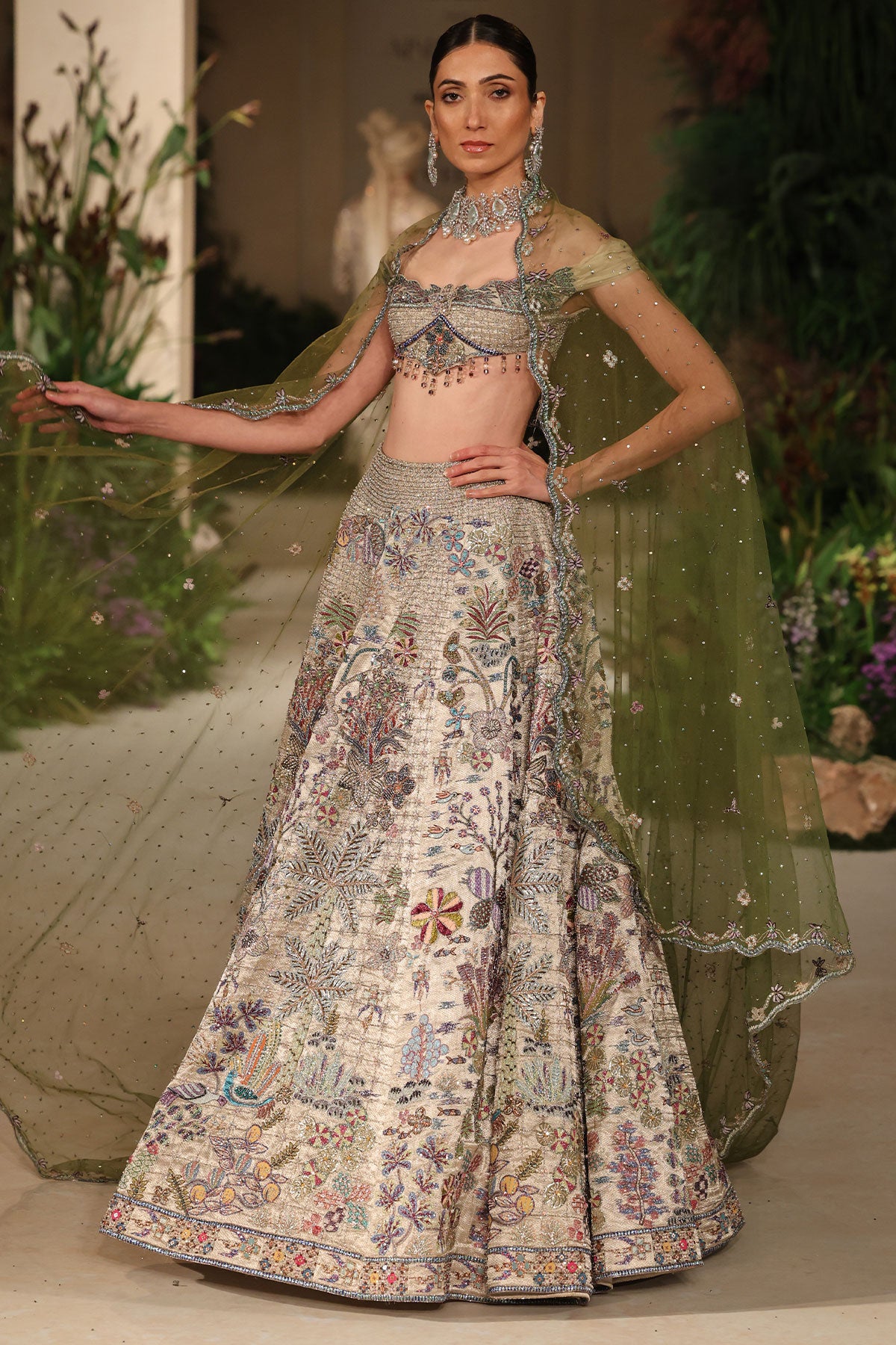 Check pattern detail highlighting brocade craftsmanship from the Wild At Heart silver lehenga