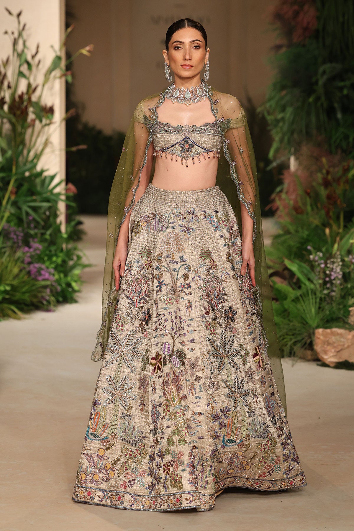 Wild At Heart silver applique embellished banarasi tissue brocade check lehenga with blouse and tulle veil shown in a full couture view