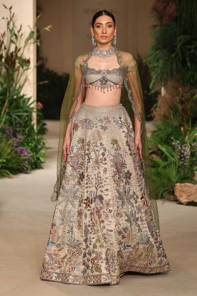 Wild At Heart silver applique embellished banarasi tissue brocade check lehenga with blouse and tulle veil shown in a full couture view