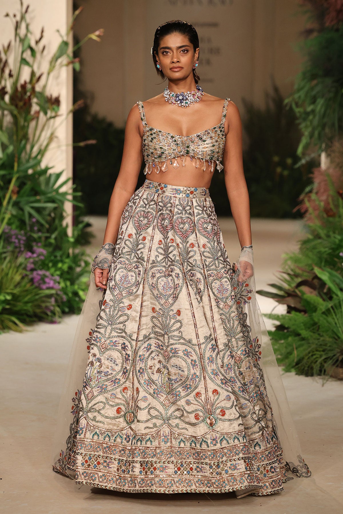 Front view of the Wild At Heart silver embellished heart lehenga revealing applique artistry and the crystal blouse