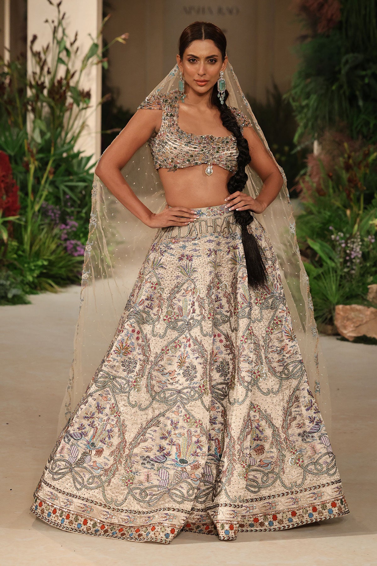 Wild At Heart silver applique embellished banarasi tissue brocade lehenga with crystal blouse and tulle veil shown in a full couture view