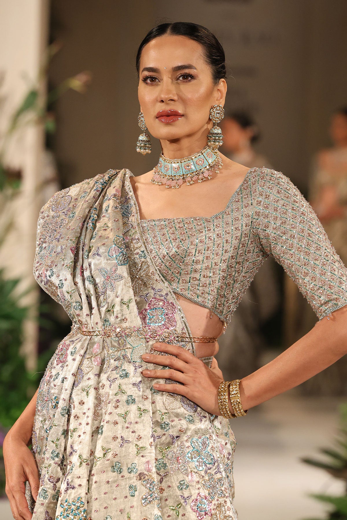 Back drape displaying the shimmering brocade texture and applique embellishment