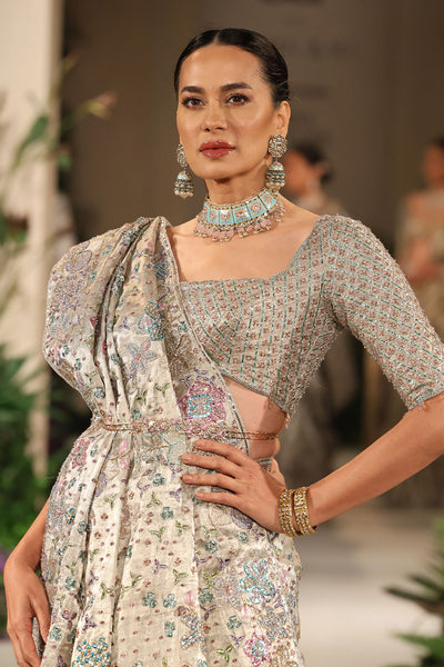 Back drape displaying the shimmering brocade texture and applique embellishment