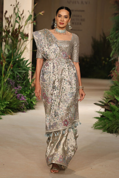 Front drape of the silver banarasi tissue brocade saree showcasing applique and embellished detailing