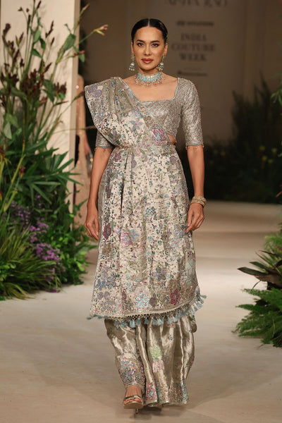 Styled look featuring the applique embellished silver banarasi brocade saree with contemporary check blouse