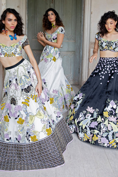 White and black border lehenga with intricate work