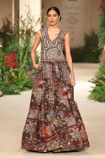 Wild At Heart teakberry organza lehenga captured in motion showing airy organza layers and printed movement
