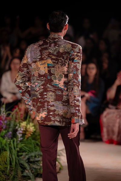 Back view of the Wild At Heart teakberry printed bandhgala showcasing refined raw silk texture