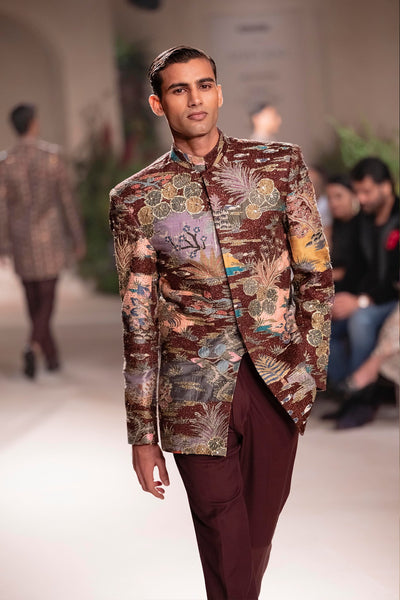 Printed detail from the Wild At Heart teakberry raw silk bandhgala revealing artistic motif placement