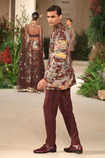 Side profile of the Wild At Heart teakberry applique embellished raw silk bandhgala showing structured elegance