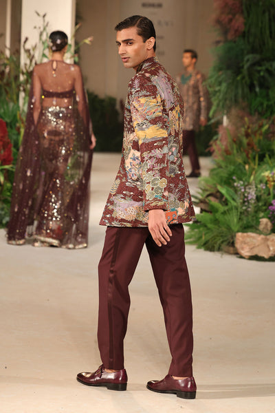 Side profile of the Wild At Heart teakberry applique embellished raw silk bandhgala showing structured elegance