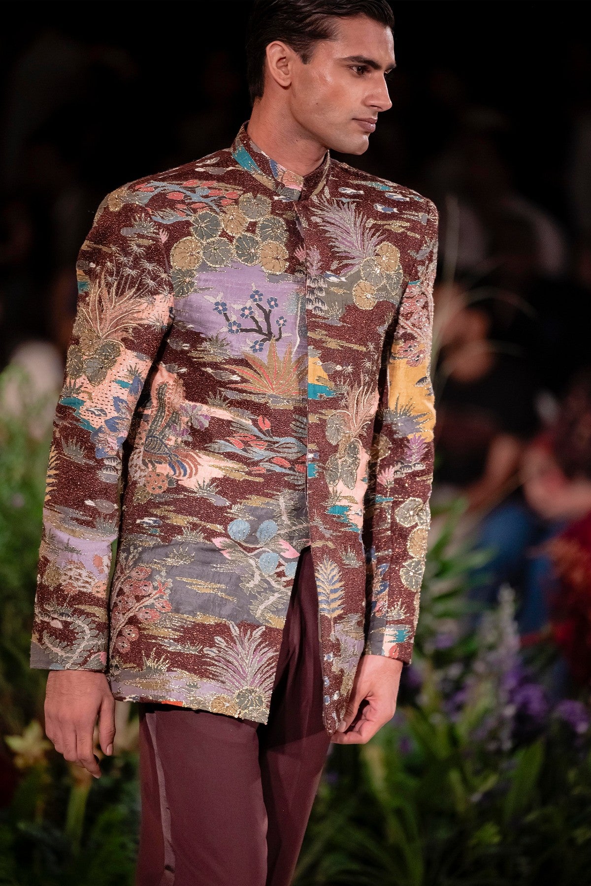 Side profile of the Wild At Heart teakberry applique embellished raw silk bandhgala showing structured elegance