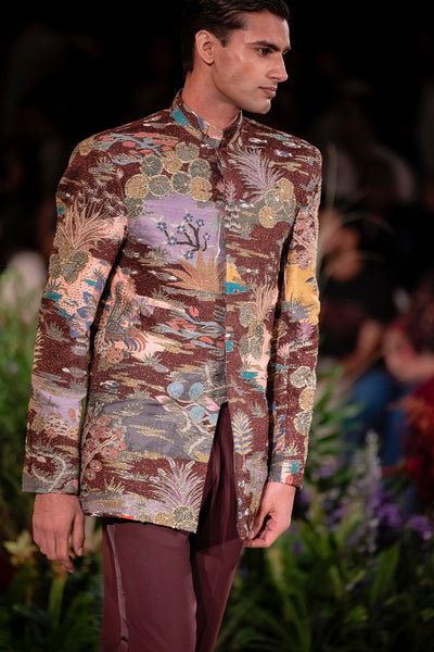 Side profile of the Wild At Heart teakberry applique embellished raw silk bandhgala showing structured elegance