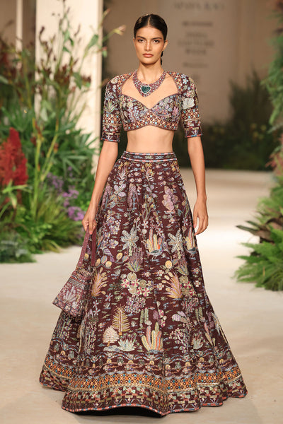 Waistline detail revealing couture shaping and applique craftsmanship from the Wild At Heart lehenga