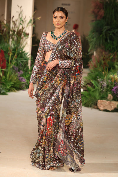 Front view of the tulle embellished beaded full sleeve blouse paired with the Wild At Heart teakberry georgette saree