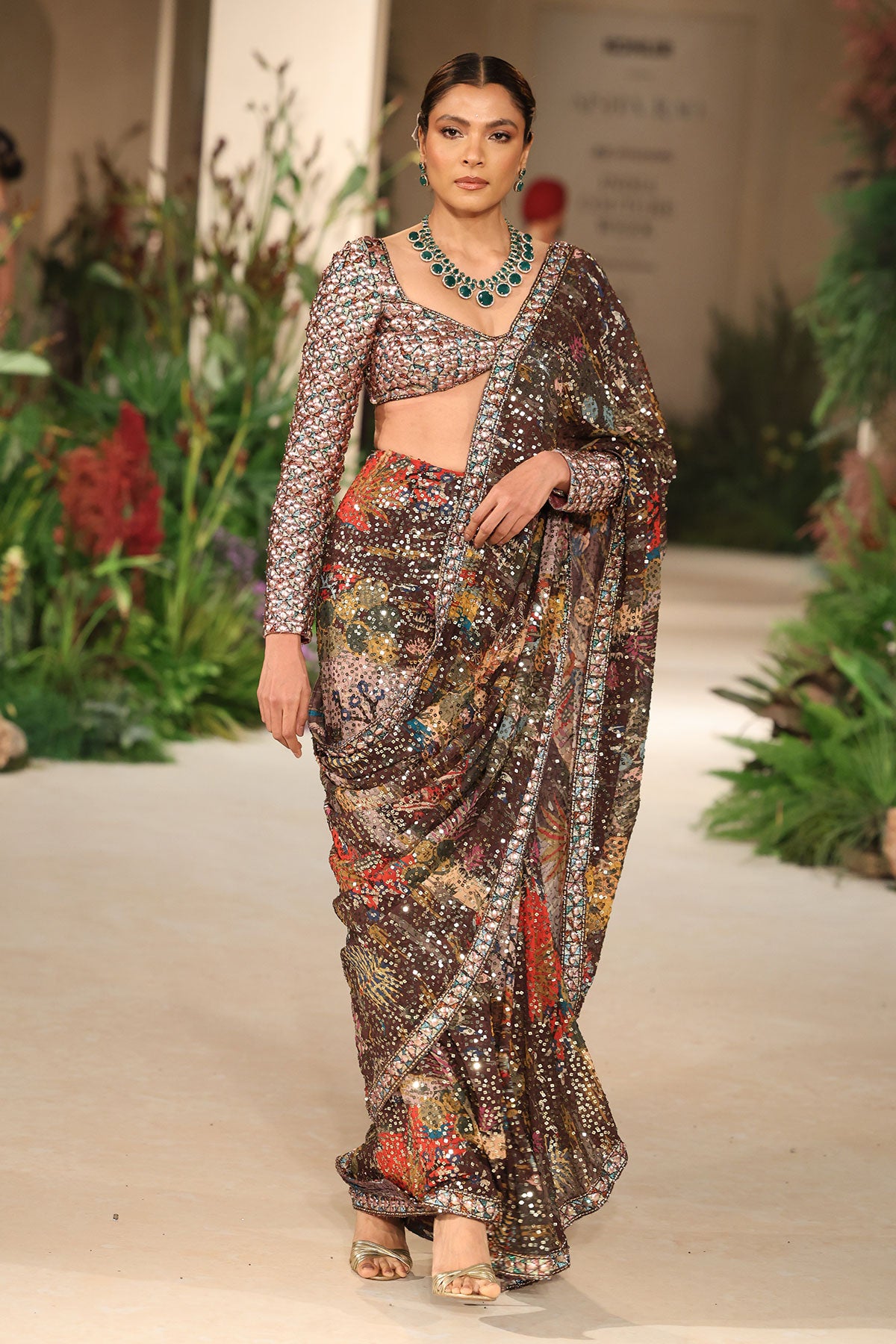 Sequin detail capturing shimmering embellishment on the Wild At Heart teakberry georgette saree