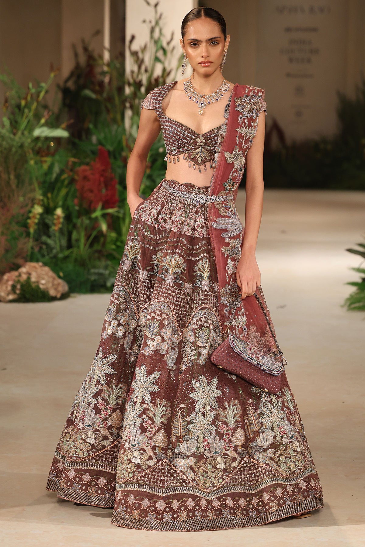 Wild At Heart teakberry applique embellished tulle lehenga with checked extended blouse and tulle dupatta shown in a full couture view