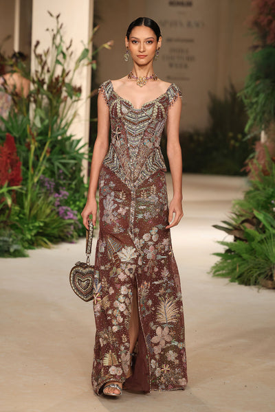 Applique detail from the Wild At Heart teakberry tulle gown showing refined handcrafted motifs