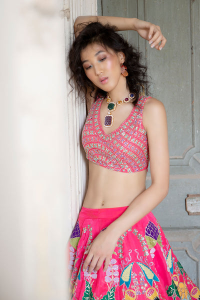 Side close-up of floral applique on raw silk