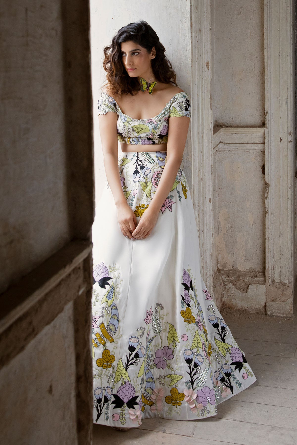 Left side profile of white lehenga outfit