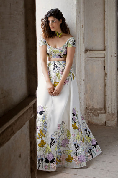 Left side profile of white lehenga outfit