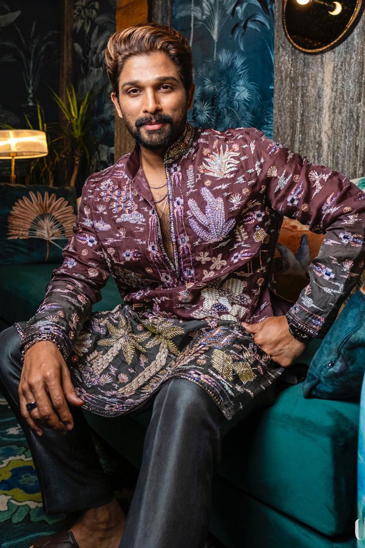 Closeup showing the teakberry-to-gunmetal ombre effect on the organza kurta worn by Allu Arjun.