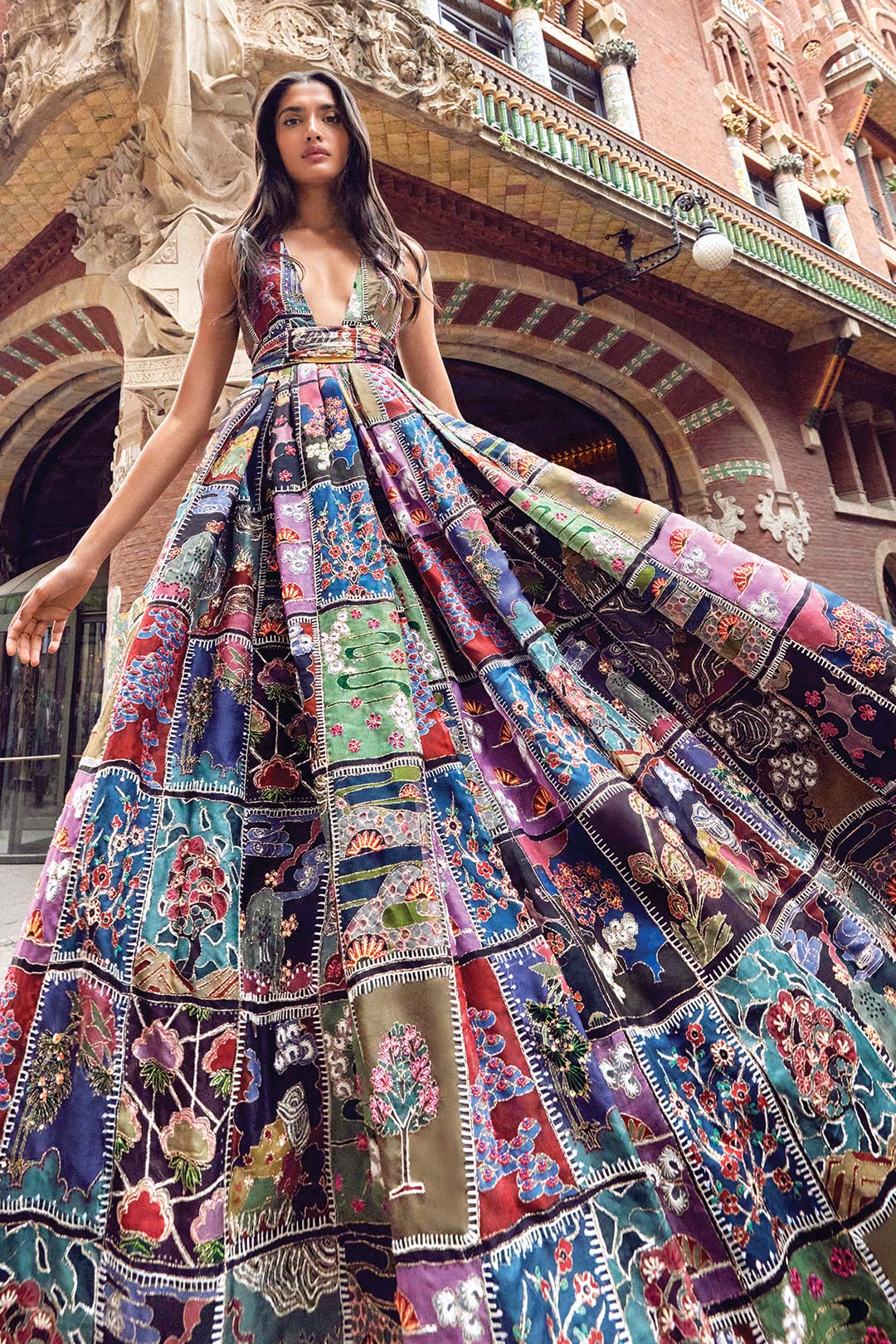 Front view of Aisha Rao Trencadís black printed gown