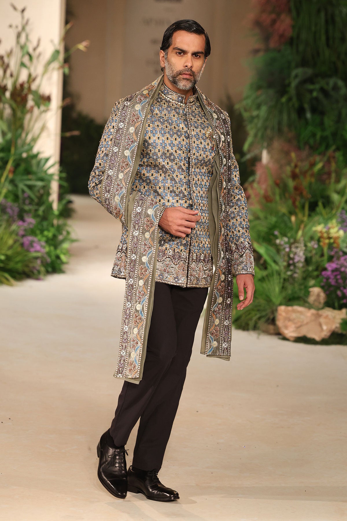 Couture-style look featuring the Wild At Heart gunmetal tissue bandhgala and stole.