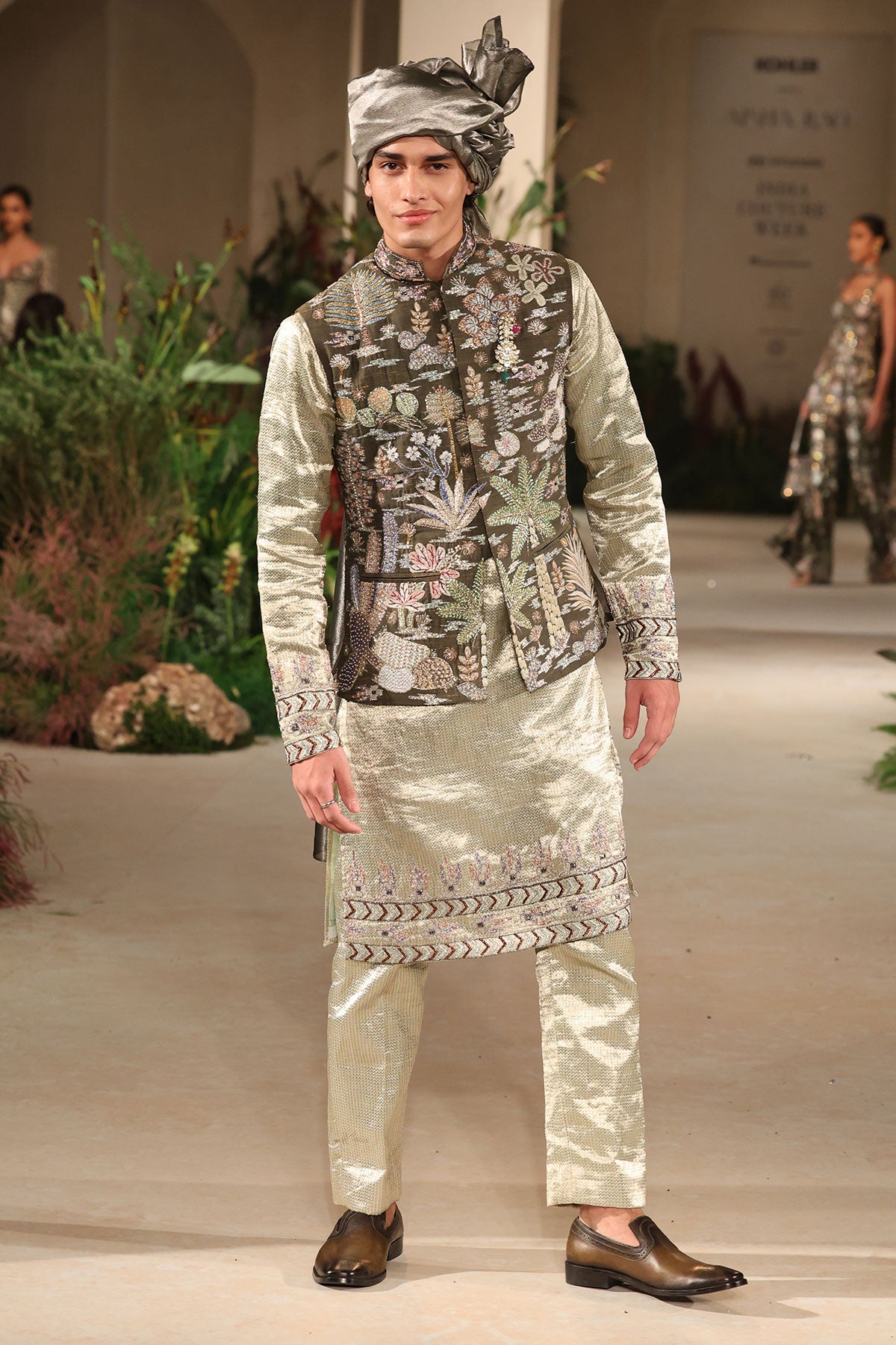 Closeup of the mint Banarasi brocade pants completing the bundi set.