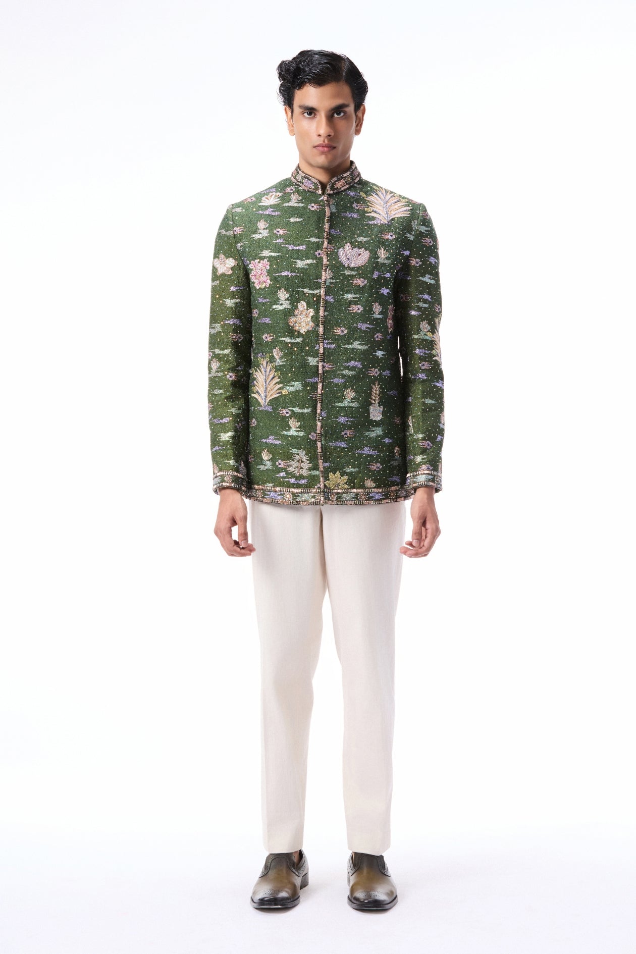 Wild At Heart lush green applique embellished raw silk bandhgala shown in a full front view.