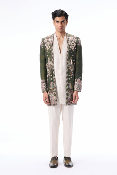 Full look of the Wild At Heart lush green raw silk open jacket styled with dupion silk kurta pants.