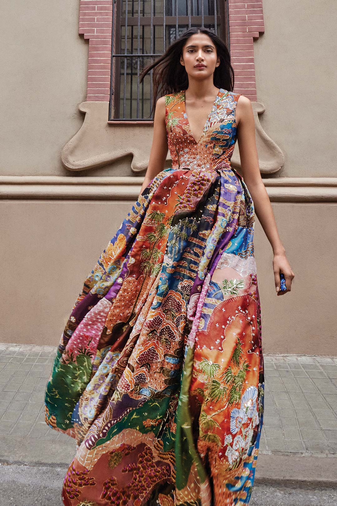 Woman wearing Aisha Rao maze-orange organza sleeveless gown