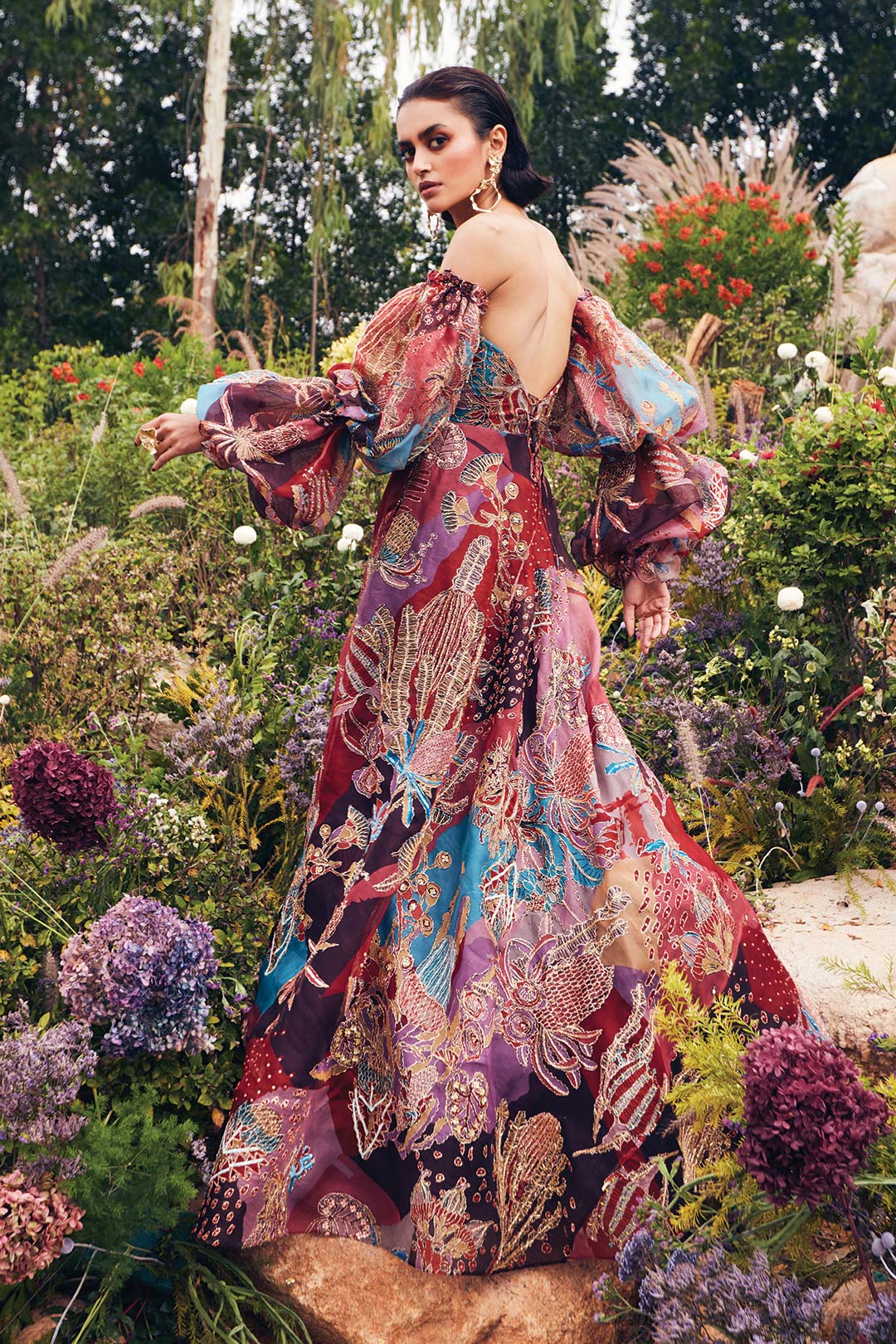 Aisha Rao plum pastiche gown side view with puffed full sleeve