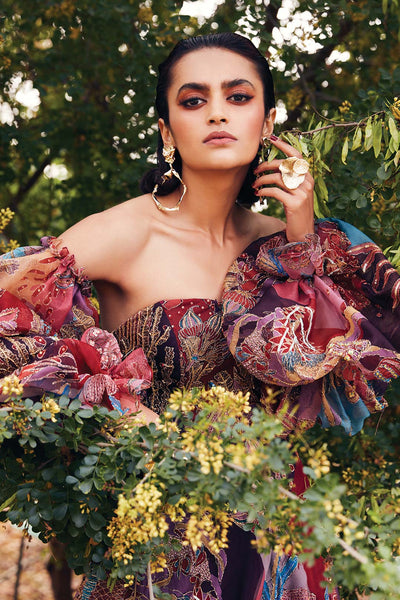 Embellished neckline and shoulder close-up on plum Aisha Rao gown