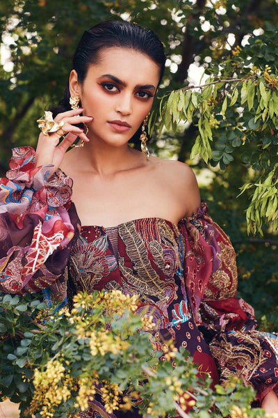 Aisha Rao gown close-up showing puff sleeve and print detail